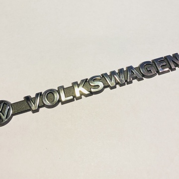 Логотип с надписью VolksWagen.