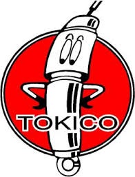 Амортизатор Tokico 56210-5C503 Nissan Largo, кузов NW, VNW, W30.