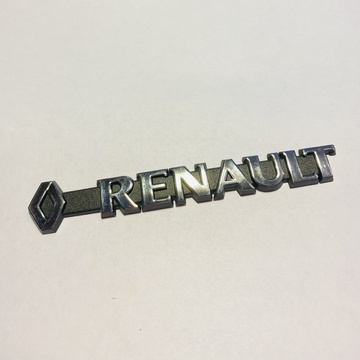 Логотип с надписью Renault.